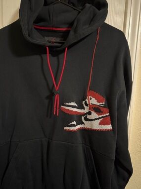 Jordan Black Pullover Hoodie with Red and White Sneaker Graphic